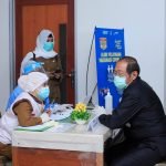 Ketua DPRD Bersama Bupati Bolmut Canangkan Program Vaksinasi COVID – 19